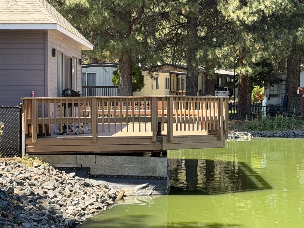 Finished pondside deck with new support blocks and piers after leveling and repair