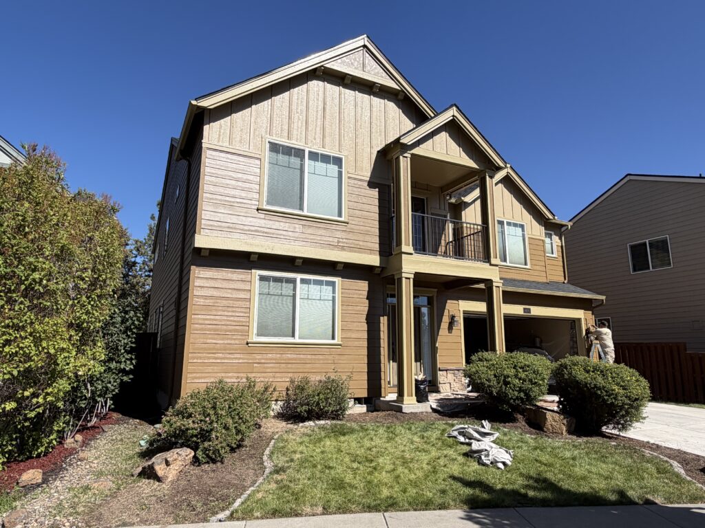 Completed exterior paint job on Bend, Oregon home after wood rot repair