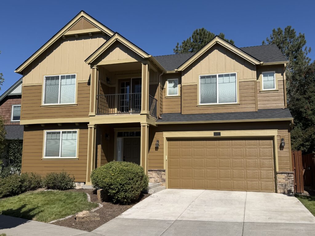 Completed exterior house painting and wood rot repair in Bend, Oregon